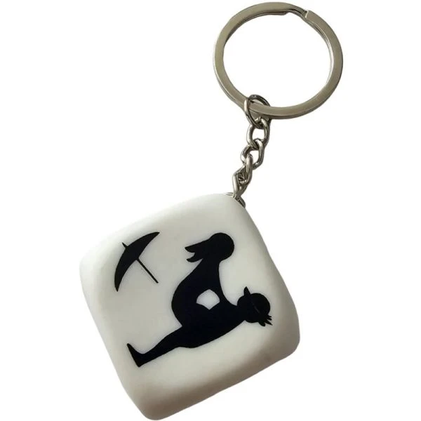 Diablo Picante keychain with white dice and positions