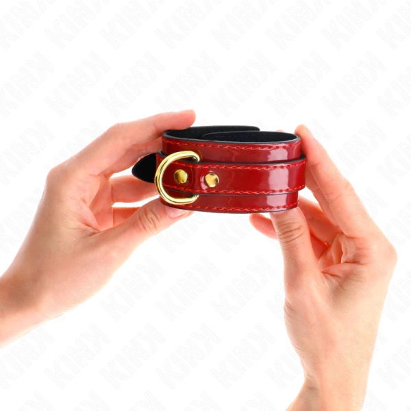 Kink Handgelenkmanschetten rot verstellbar mit Goldkette Kink Handgelenkmanschetten rot verstellbar mit Goldkette
